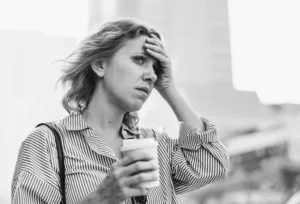 tensed-woman-is-late-for-work-300x204