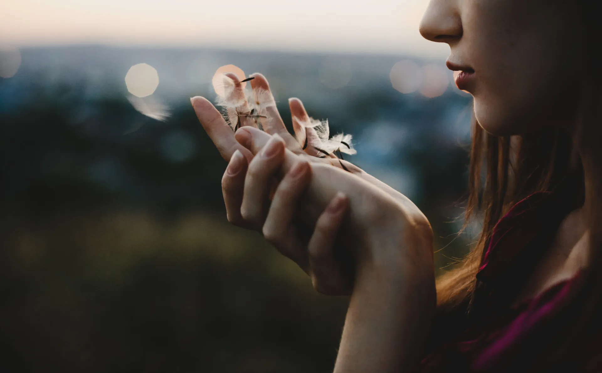 female-portrait-nature-pretty-woman-plays-with-dandelion-stand-scaled